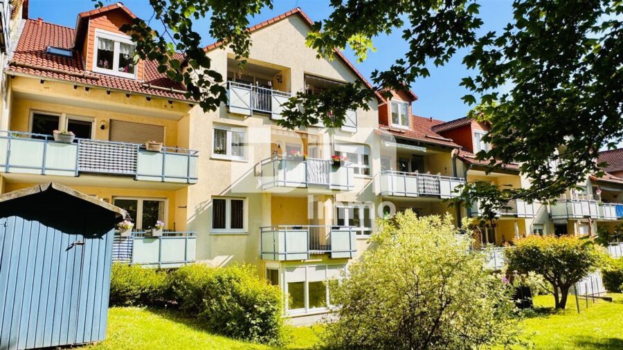 Hochklassige Dreizimmerwohnung im 1.OG mit Loggia + TG Stellplatz in gesuchter Lage - Rückansicht